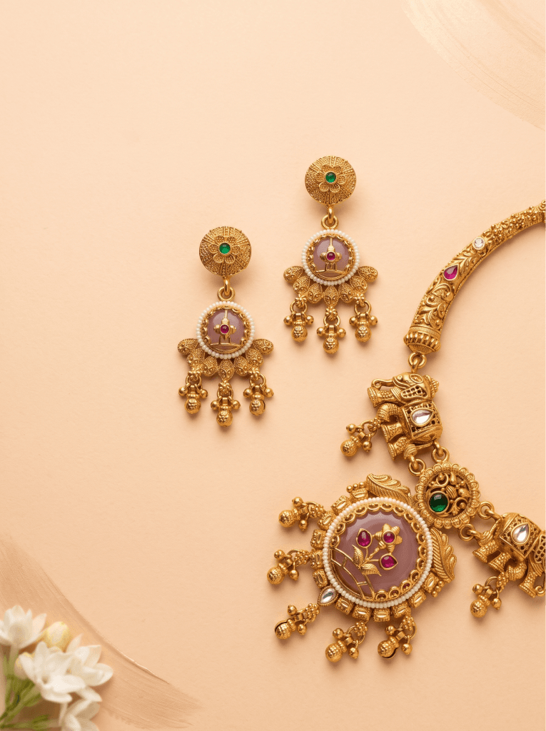 Gold temple jewellery necklace and earrings set